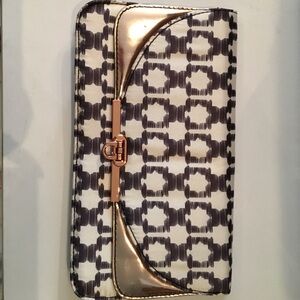 H&M fabric clutch with metallic accents